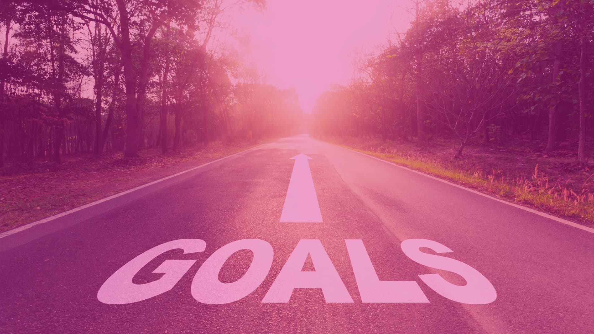 Goal setting and adapt framework - road with "goals" word painted on it